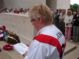 O's supporter Theresa Burns reads a war poem